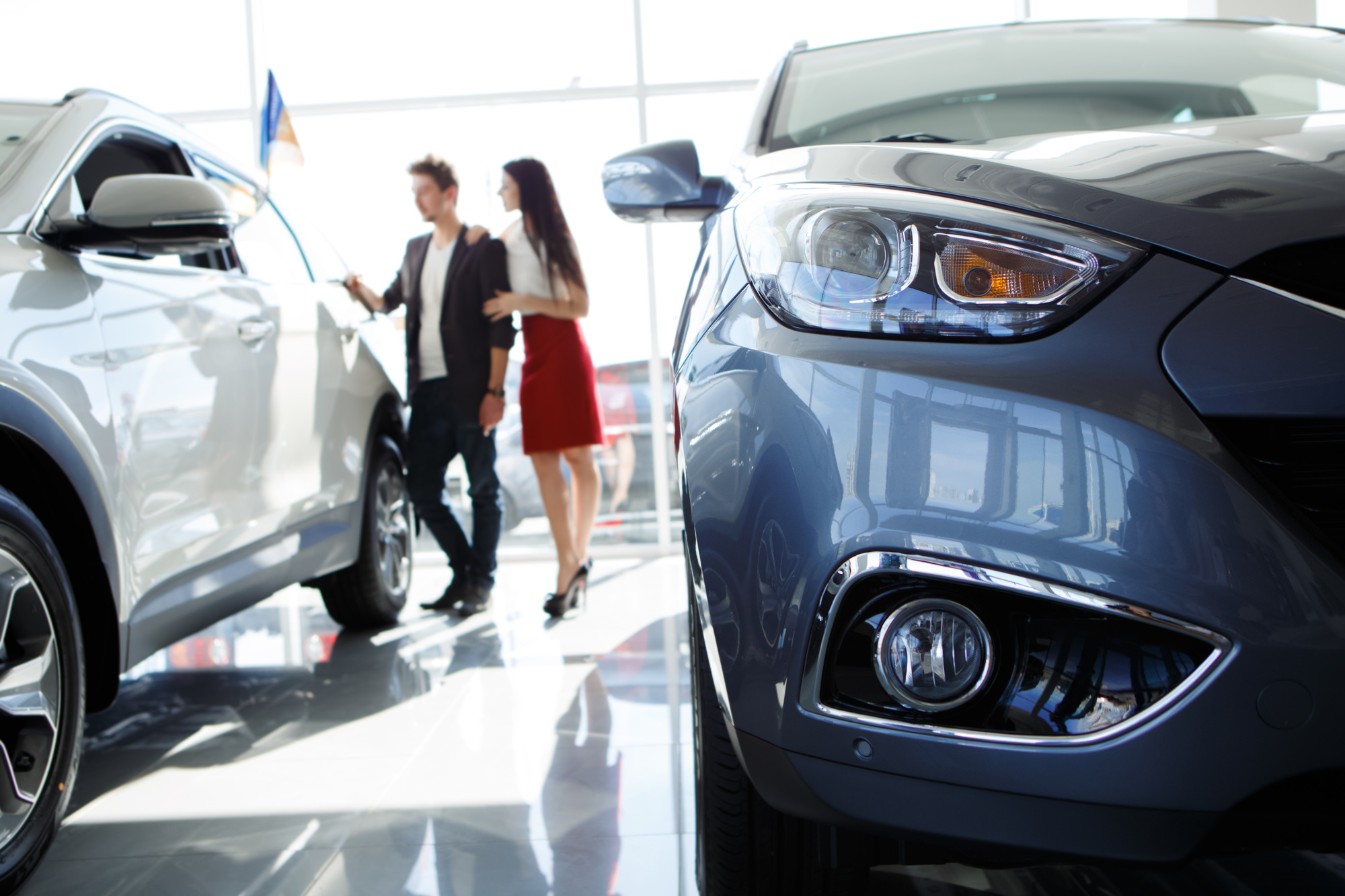 people shopping for a car