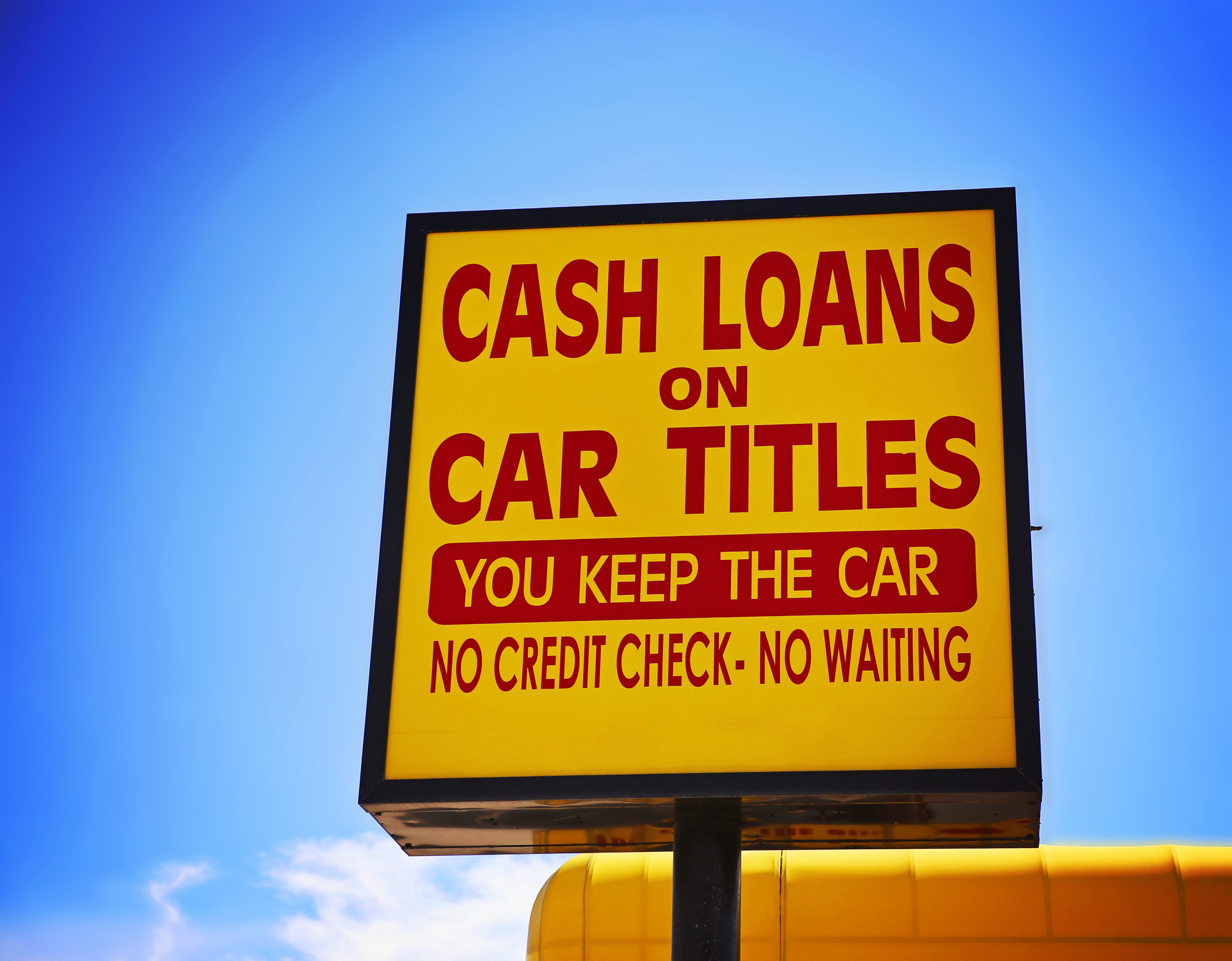 car loans and car titles sign