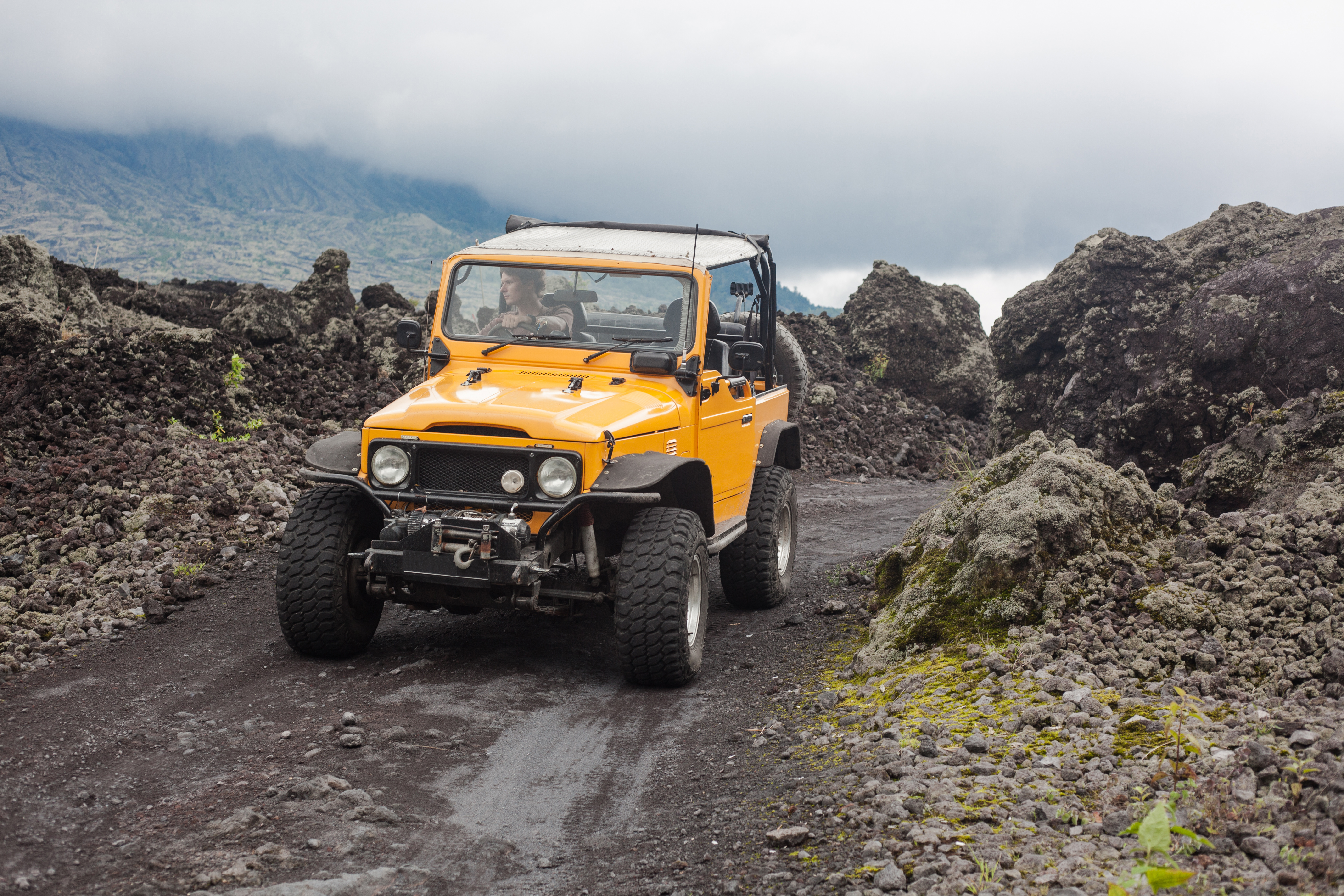 off road vehicle on rocky road