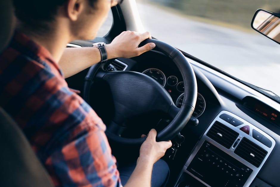 person driving safely in car