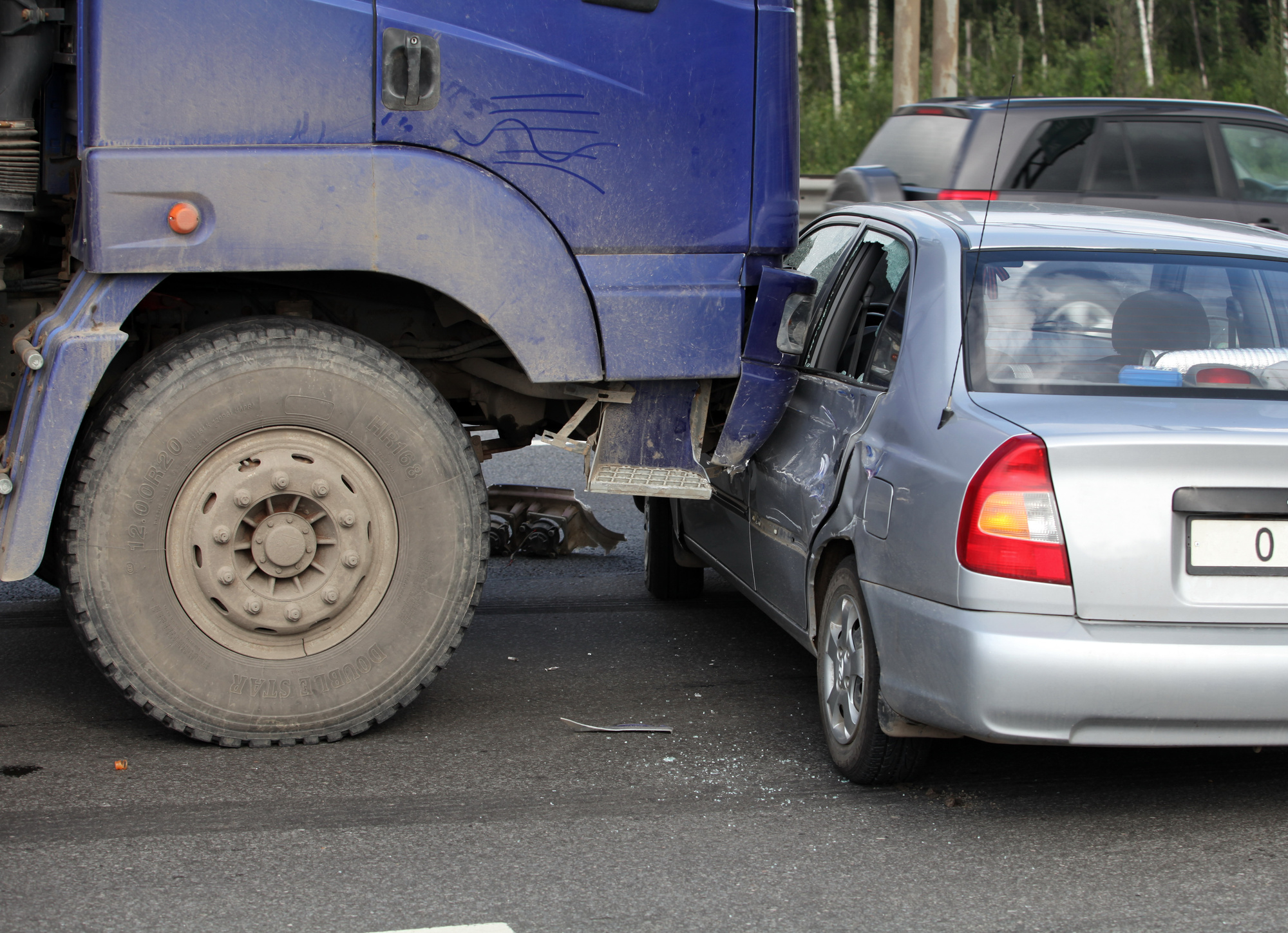 Big Truck Collision With a Sedan Type Car